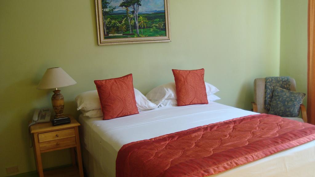 Heritage Inn Trinidad Belmont Rum bild